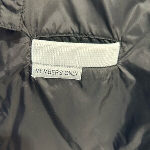 Members Only black and white jacket.  Windbreaker style/material.